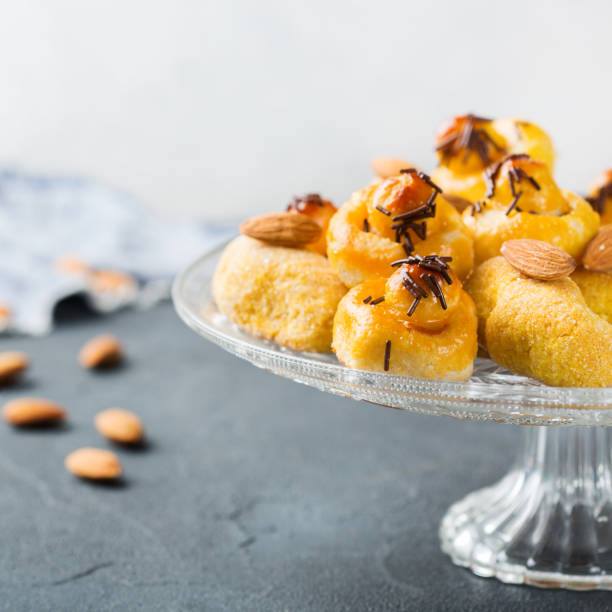 istock Almond pastry, cookies, biscuits, sweets on a table 862761998