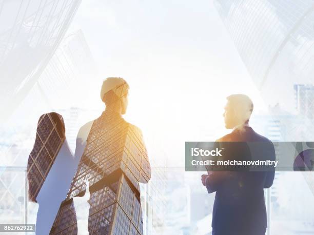 Abstract Business Concept Three Silhouettes Businessmen Stock Photo - Download Image Now