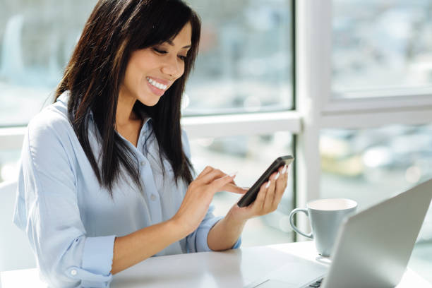 istock Attentive female person searching necessary number 862762944