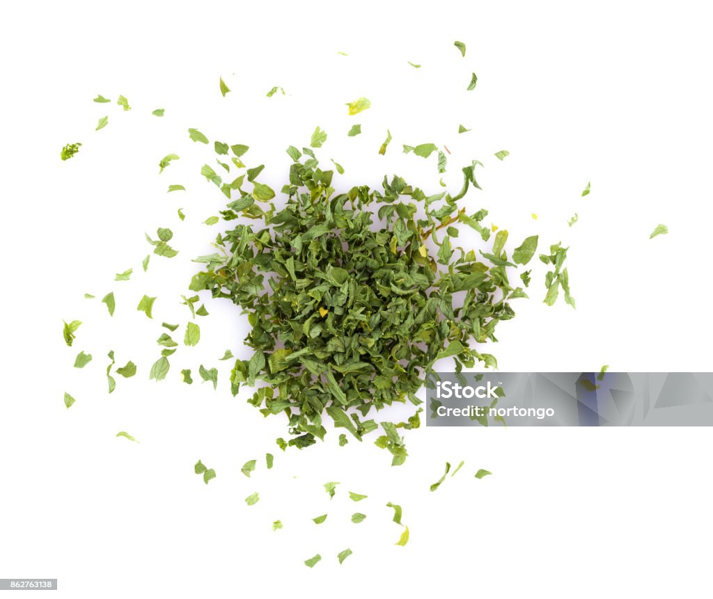 dried parsley isolated on white background Cutting Stock Photo
