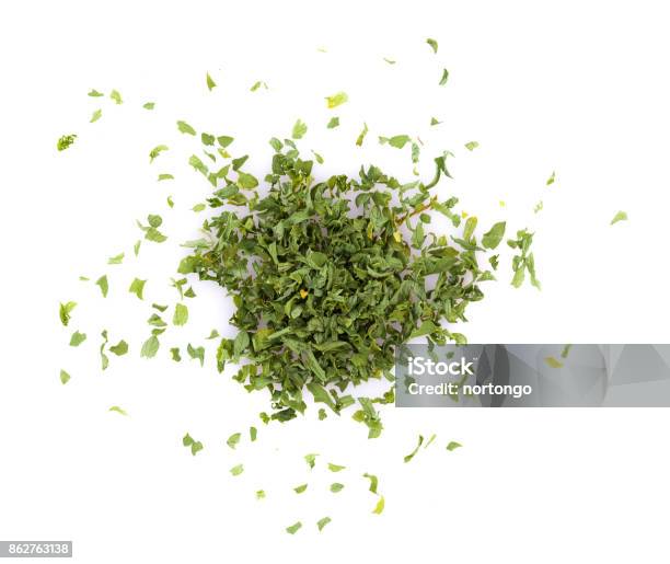 Dried Parsley Isolated On White Background Stock Photo - Download Image Now - Cutting, Herb, Parsley