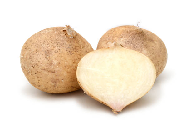 Yam bean ( Jicama ) is bulbous root vegetable fruit food on the white background stock photo
