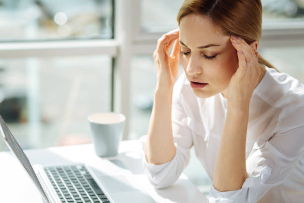 istock Serious female person sitting with closed eyes 862766880