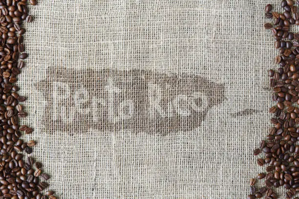 Photo of Burlap texture with coffee beans border
