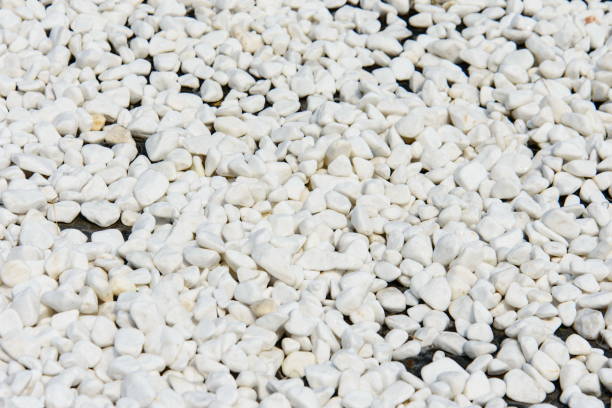 istock White gravel pebble stone texture for a garden pathway 862780428