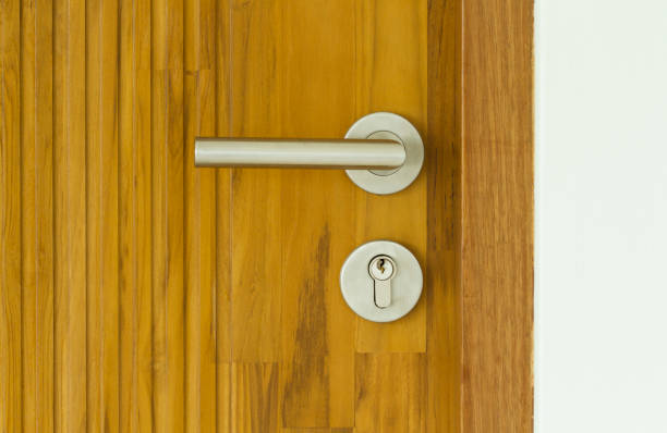 istock Modern style door handle on wooden door 862780958