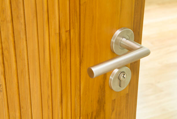 istock Modern style door handle on wooden door 862786446