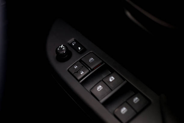 Finger push lock button of car doors.