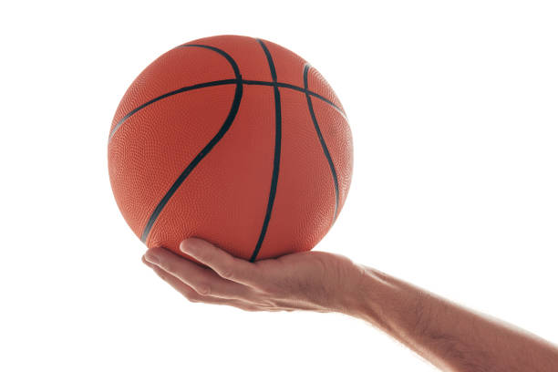 istock Male hand with basketball isolated on white background 862786802