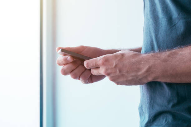 istock Male hands with smartphone 862786856