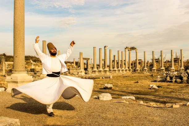 perge is also reborn... Perge, Turkey Whirling dervish, Ishak Urun at the Perge, Turkey konya stock pictures, royalty-free photos & images