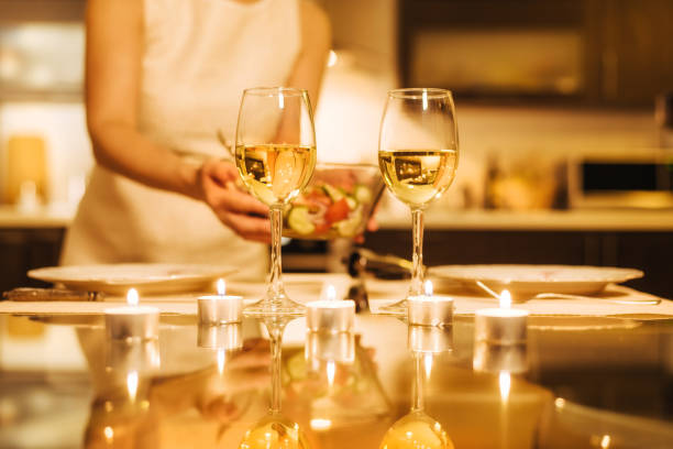 istock Woman preparing supper for two persons. 862823982