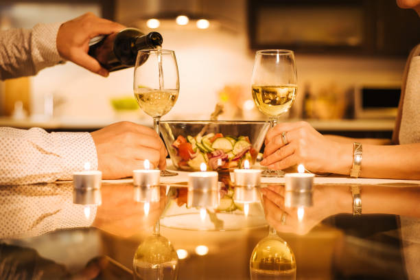 Wine is poured into a glass.