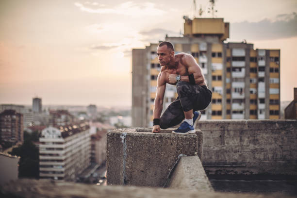 istock Strong man on top of the building 862832272