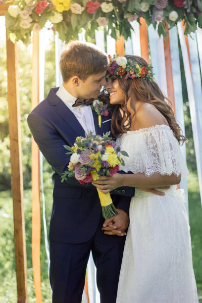 istock Beautiful wedding couple - bride and groom during wedding ceremony 862871436