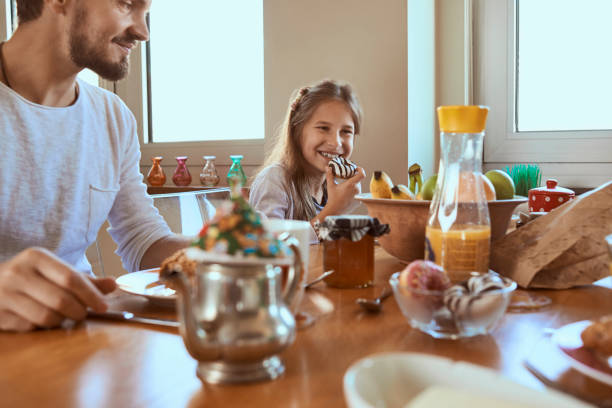 istock family having breakfast together 862931424