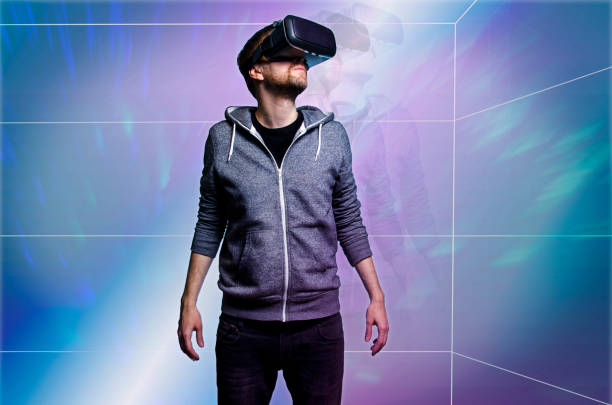 istock Man with VR glasses in virtual 3D world 862957500