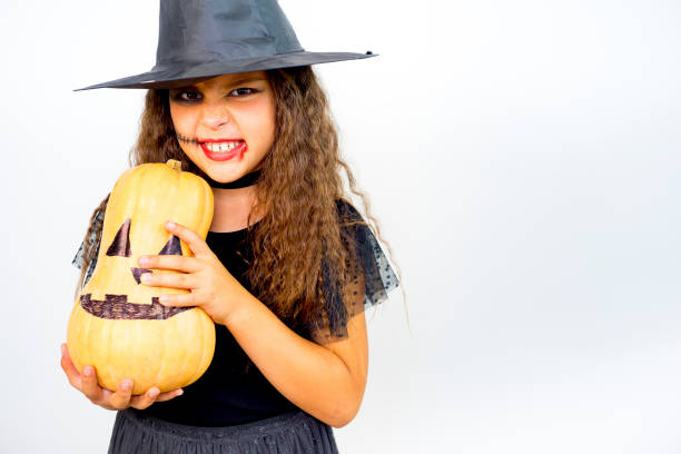 istock Girl in witch costume 862965848