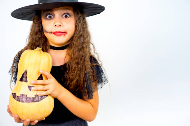 istock Girl in witch costume 862971474