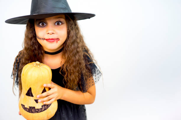 istock Girl in witch costume 862974114