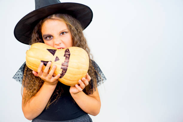 istock Girl in witch costume 862996860