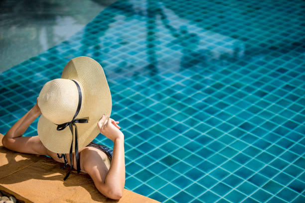 istock Woman at the pool. 863022184