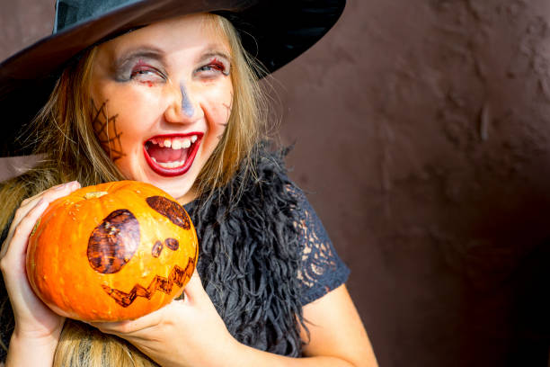 istock Girl in witch costume 863036838