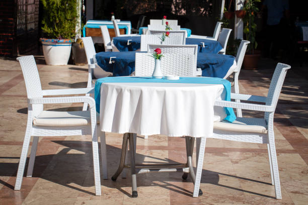 istock Table and chairs in empty cafe near the beach. Kemer, Turkey 863096500