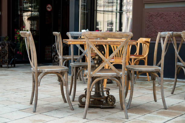 istock Empty tables and chairs on street cafe 863101738