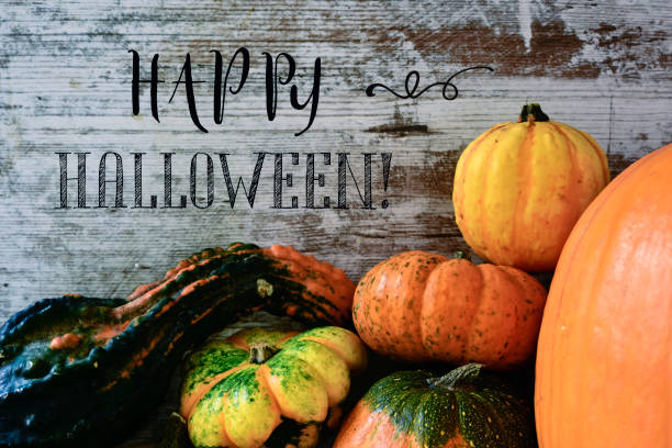 istock text happy halloween and pumpkins 863125394