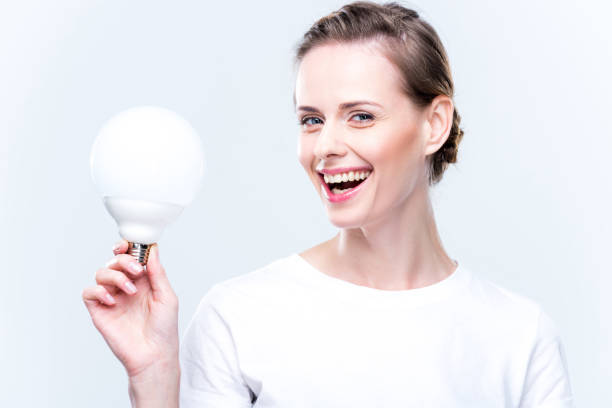 istock happy woman with light bulb 863137860