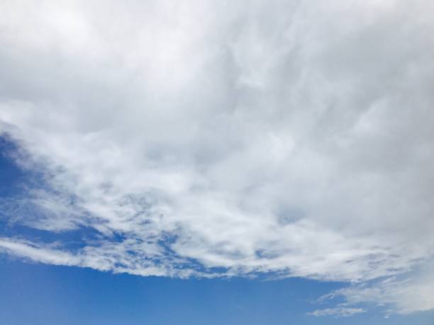 Big cloud against blue sky stock photo