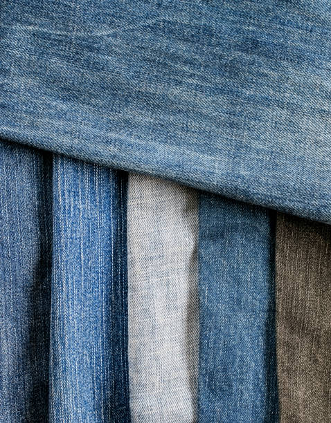 istock stylish textured background frame from strips of denim in different shades 863141874