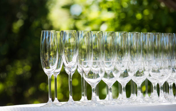 istock Empty glasses arranged on a table in the restaurant, cafe, or bar. Preparation for the birthday, wedding, or any celebration day. 863155338