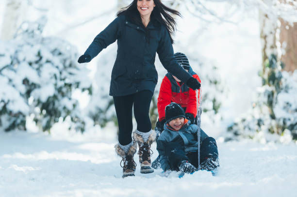 istock Snowy playground with mom! 863155976