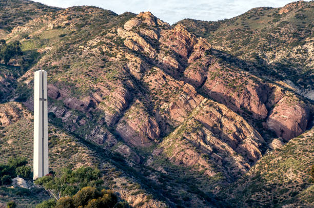 View of large cross with mountains background