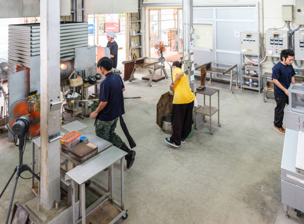 istock Japanese Working in Glass Blowing Factory 863158376