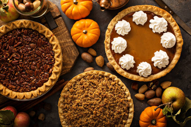 istock Fall traditional pies pumpkin, pecan and apple crumble 863158392