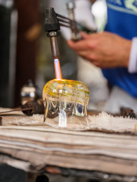 A Japanese man working in a glass blowing factory in Okinawa, Japan.