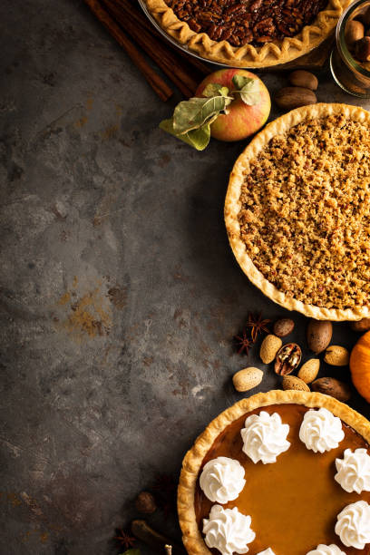 istock Fall traditional pies pumpkin, pecan and apple crumble 863162744