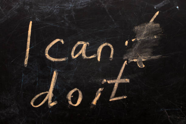 istock Changing the word I can't to I can do it text on  blackboard background 863170566