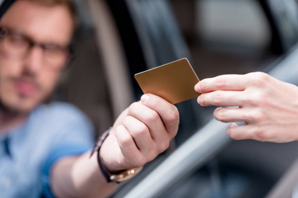 istock man paying with credit card 863181848