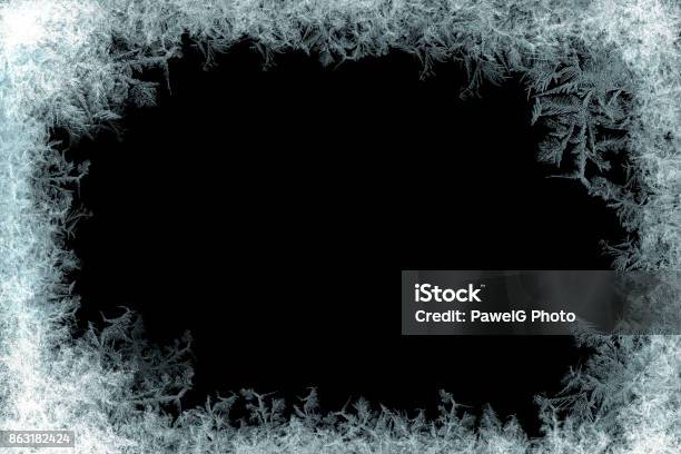 Decorative Ice Crystals Frame On Black Matte Background Stock Photo - Download Image Now