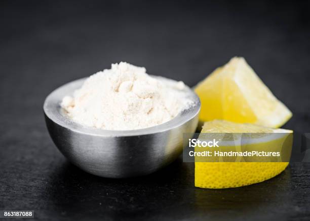 Fresh Made Lemon Powder On A Slate Slab Stock Photo - Download Image Now