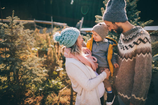 istock Family in a Christmas tree quest 863237364