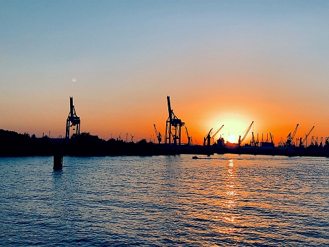 Sunset at the commercial harbor in Hamburg