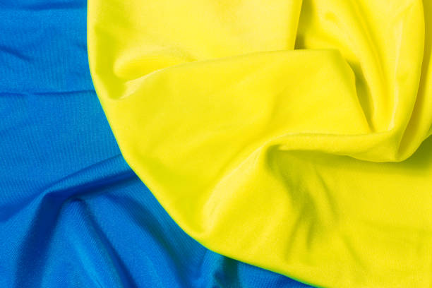 istock bright yellow and blue pleated fabric. As Ukrainian flag 863251876