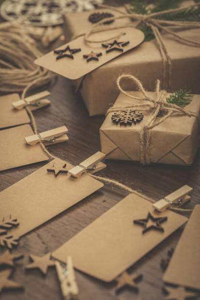 istock Christmas. Gifts. Cardboard name tags on a string 863264426
