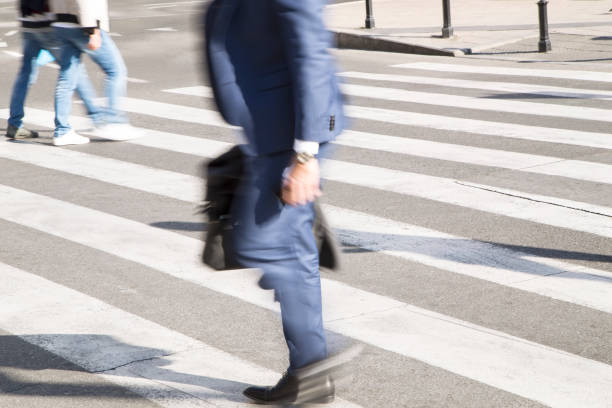 istock People crossing a street 863269882
