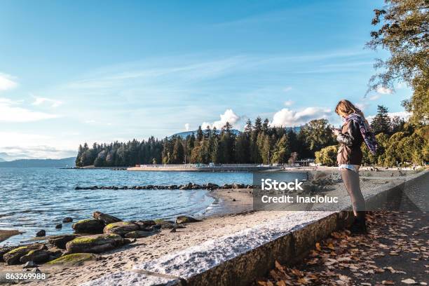Girl Near Stanley Park In Vancouver Canada Stock Photo - Download Image Now - Stanley Park - Vancouver - Canada, Vancouver - Canada, Third Beach